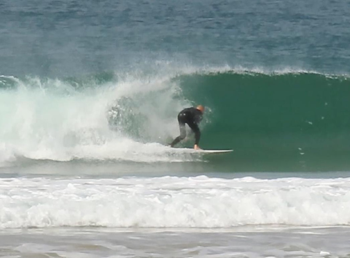 Vasco surfing a wave near Lisbon, Portugal
